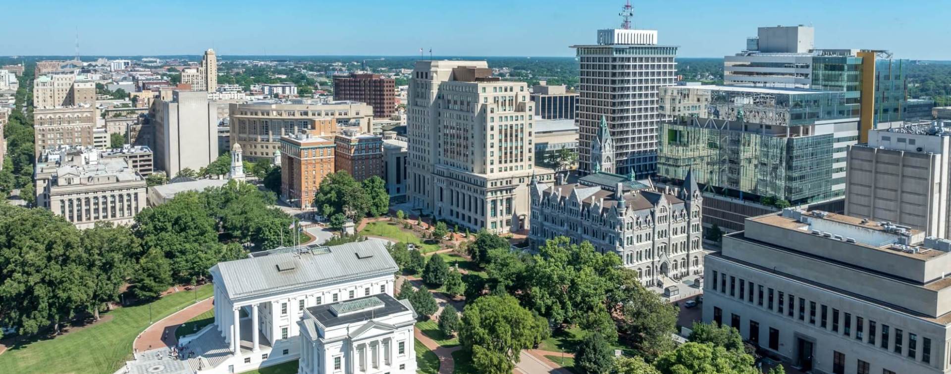 aerial panoramic drone view of commercial real estate buildings in richmond virginia central business district