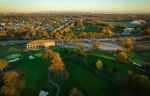 aerial panoramic view of the kenilworth new jersey golf course in the closer plane and the Northeast Science & Technology (NEST) Center (frmerly mercl campus) further back and to the right