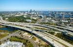 aerial panoramic view of highways heading into jacksonville florida, with the jacksonville skyline in the background