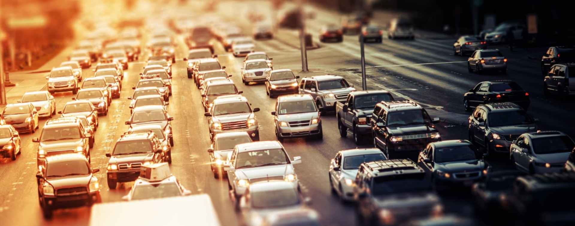 photo of busy 12-lane road at sunset used for an article about commute times in the largest cities of the southern us region